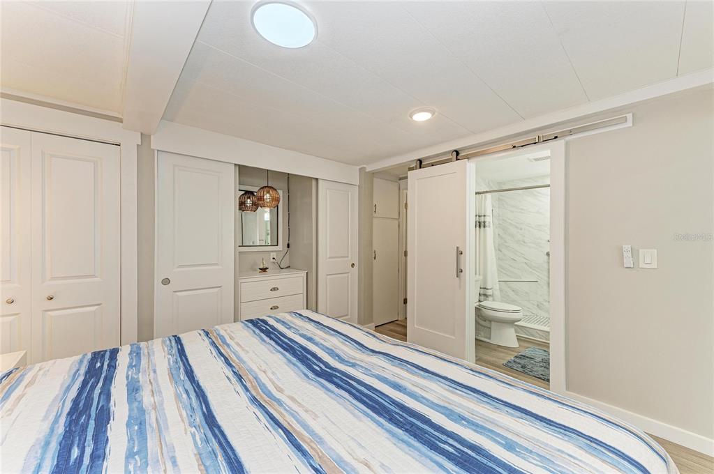 10315 Cortez Road West, Unit 61 Bradenton, FL 34210 - Photo 22 of 46 a view of a bathroom with a sink and a mirror