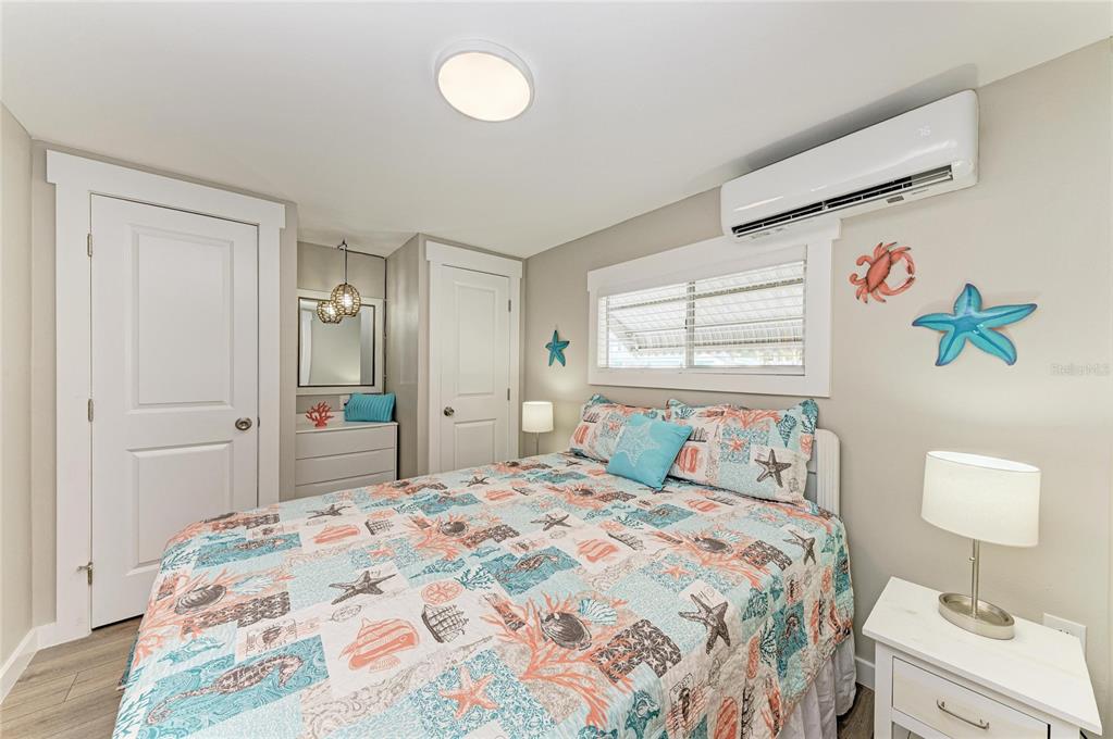 10315 Cortez Road West, Unit 61 Bradenton, FL 34210 - Photo 24 of 46 a bedroom with a bed and a window