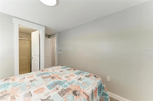 a view of a walk in closet and bedroom