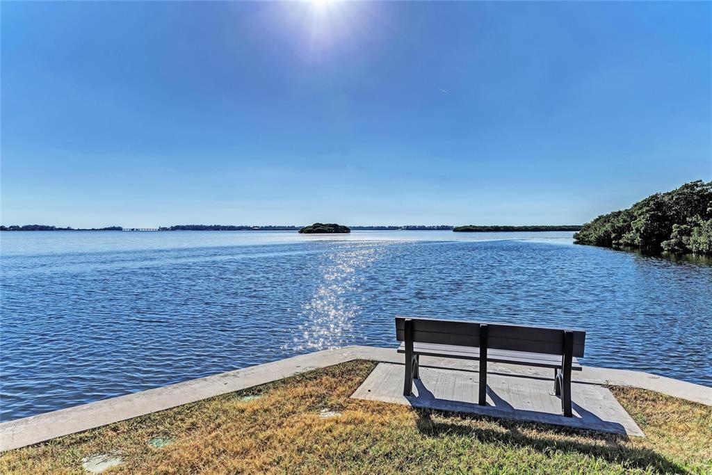 10315 Cortez Road West, Unit 61 Bradenton, FL 34210 - Photo 32 of 46 a view of a lake with outdoor seating space