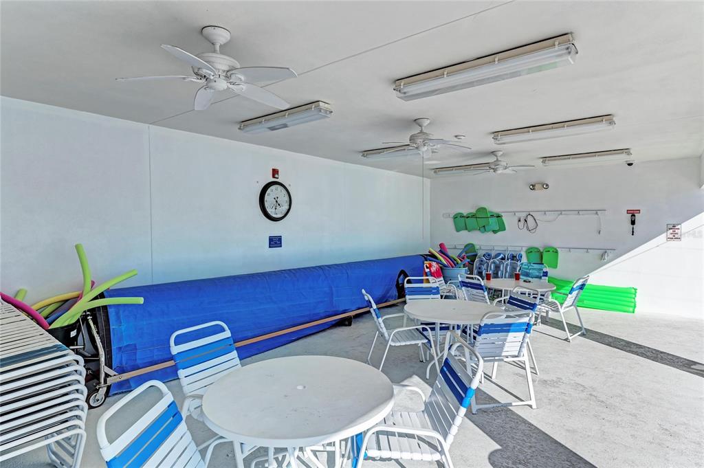 10315 Cortez Road West, Unit 61 Bradenton, FL 34210 - Photo 41 of 46 a room with furniture and a chair