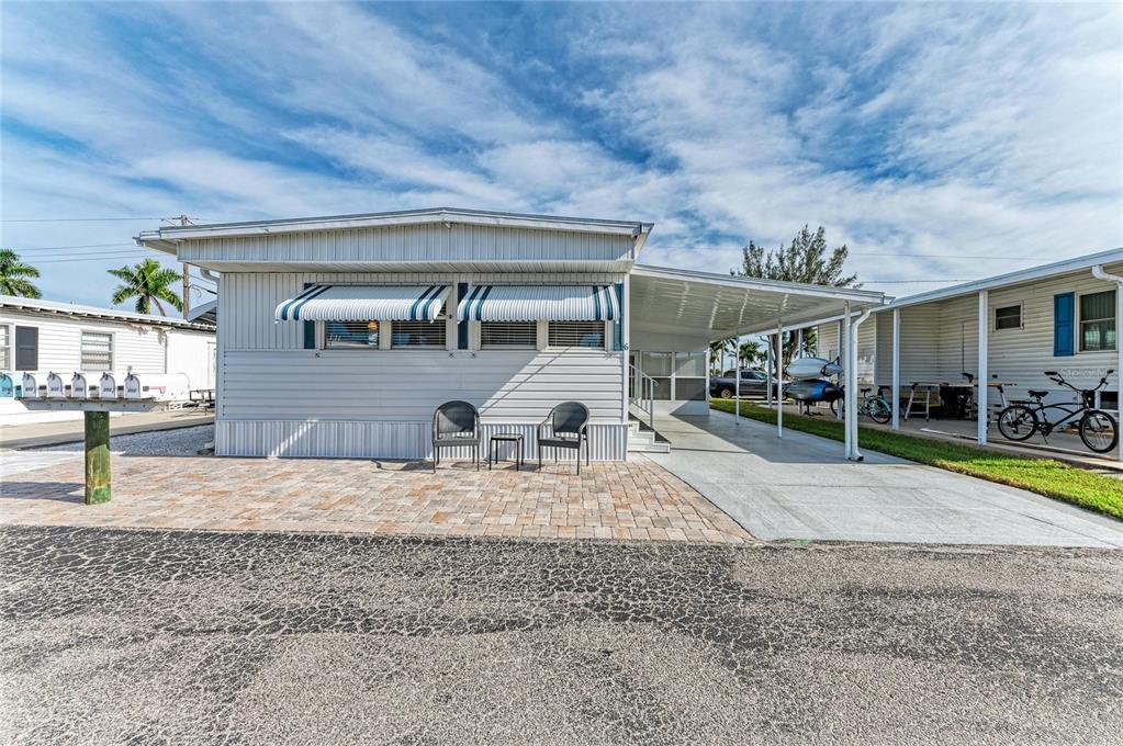 10315 Cortez Road West, Unit 61 Bradenton, FL 34210 - Photo 8 of 46 a front view of a house with garden