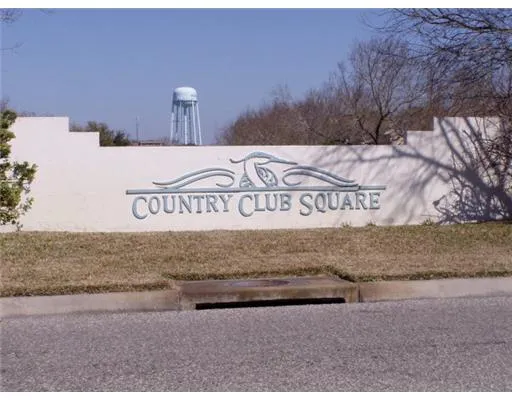 a view of outdoor space with wooden fence