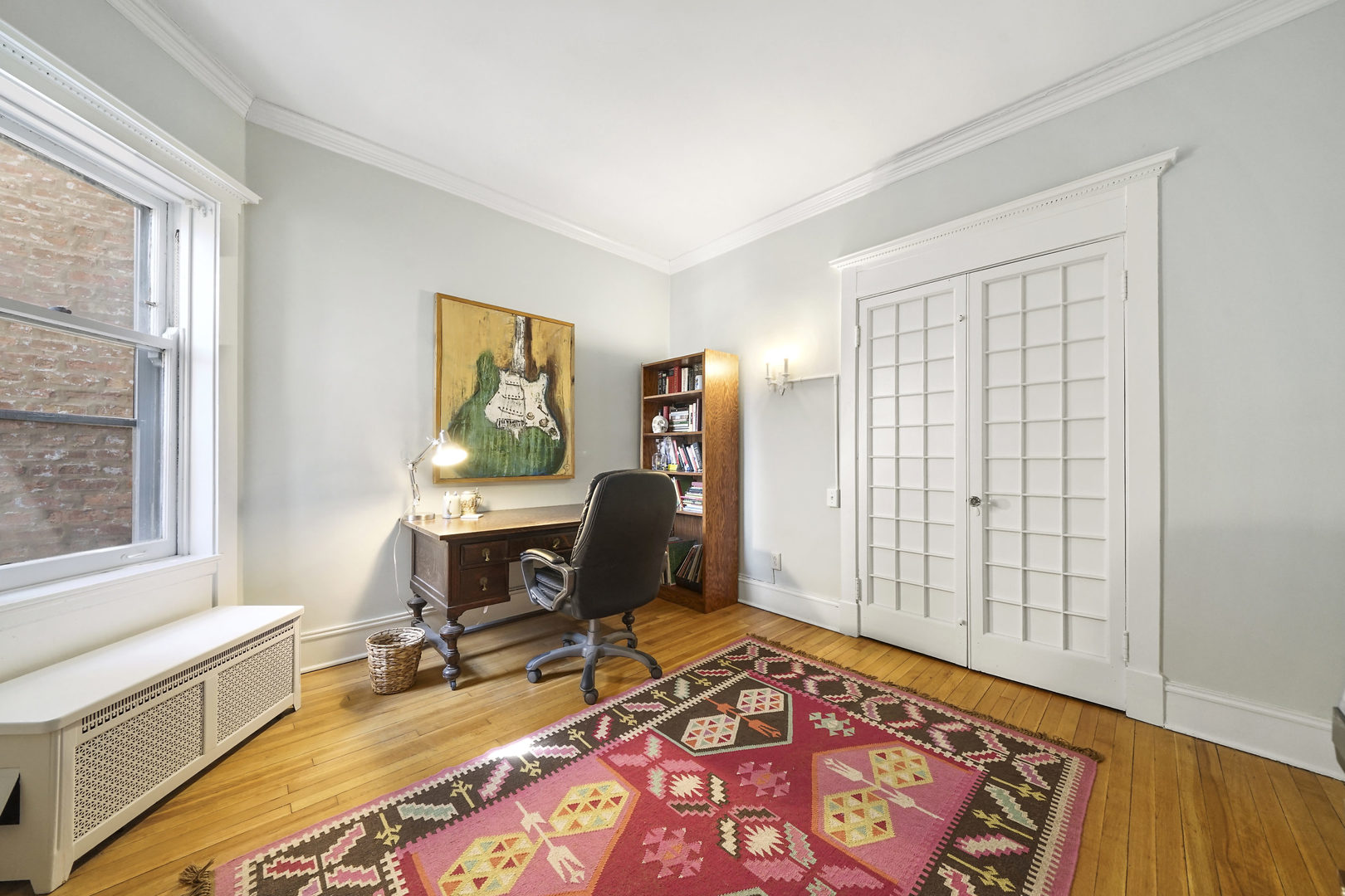 5707 South Blackstone Avenue, Unit 2 Chicago, IL 60637 - Photo 15 of 25 a workspace with furniture and a window