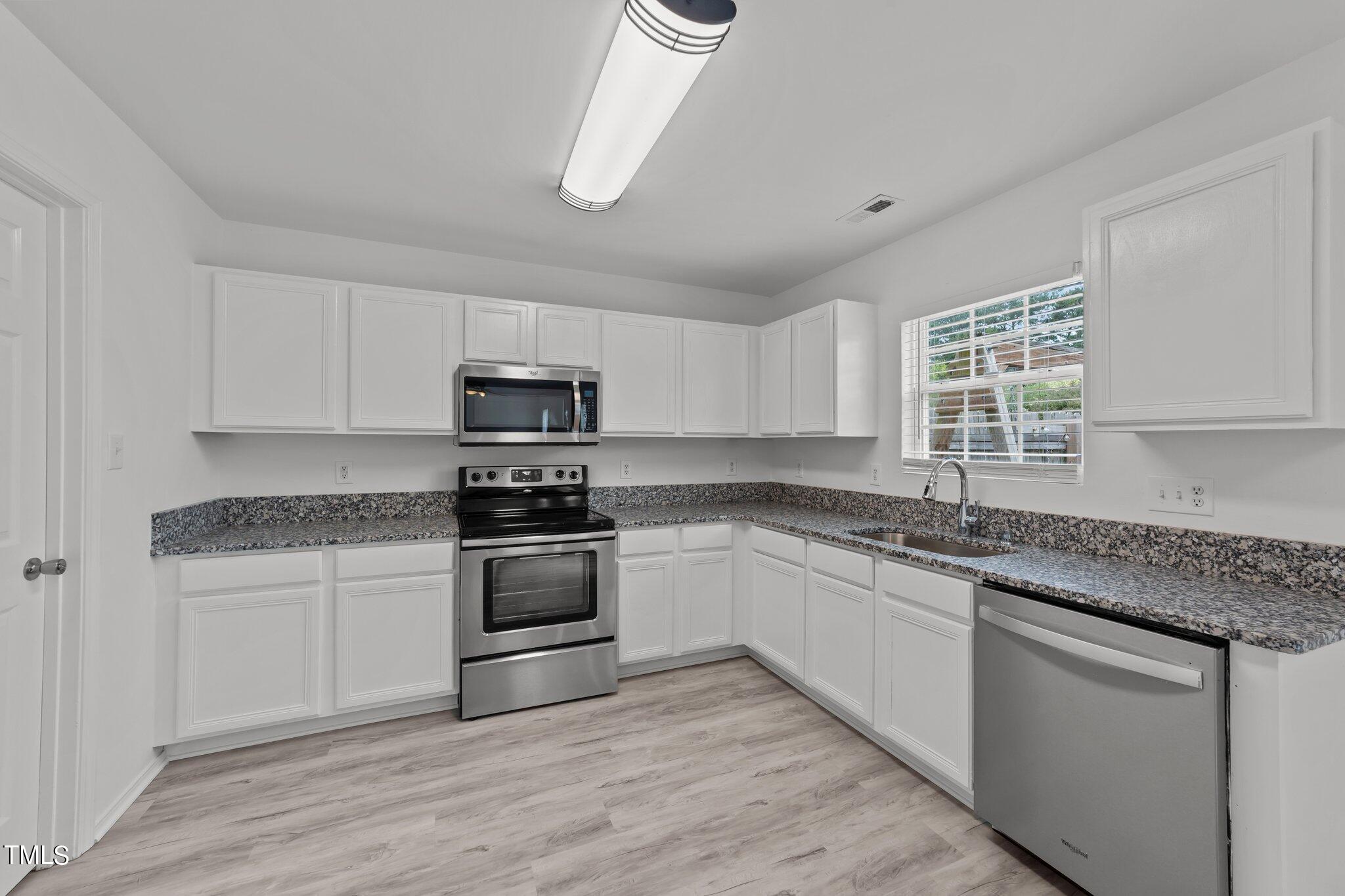 5357 Thunderidge Drive Raleigh, NC 27610 - Photo 15 of 54 Kitchen