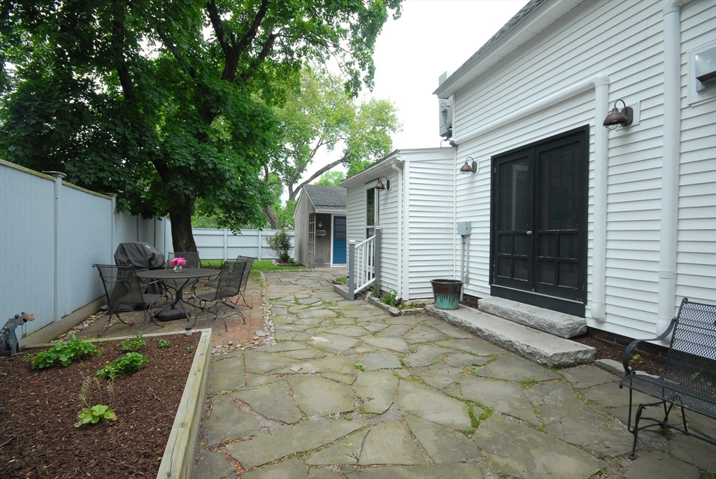 1832 Main Street Concord, MA 01742 - Photo 25 of 25 a view of a house with backyard and sitting area