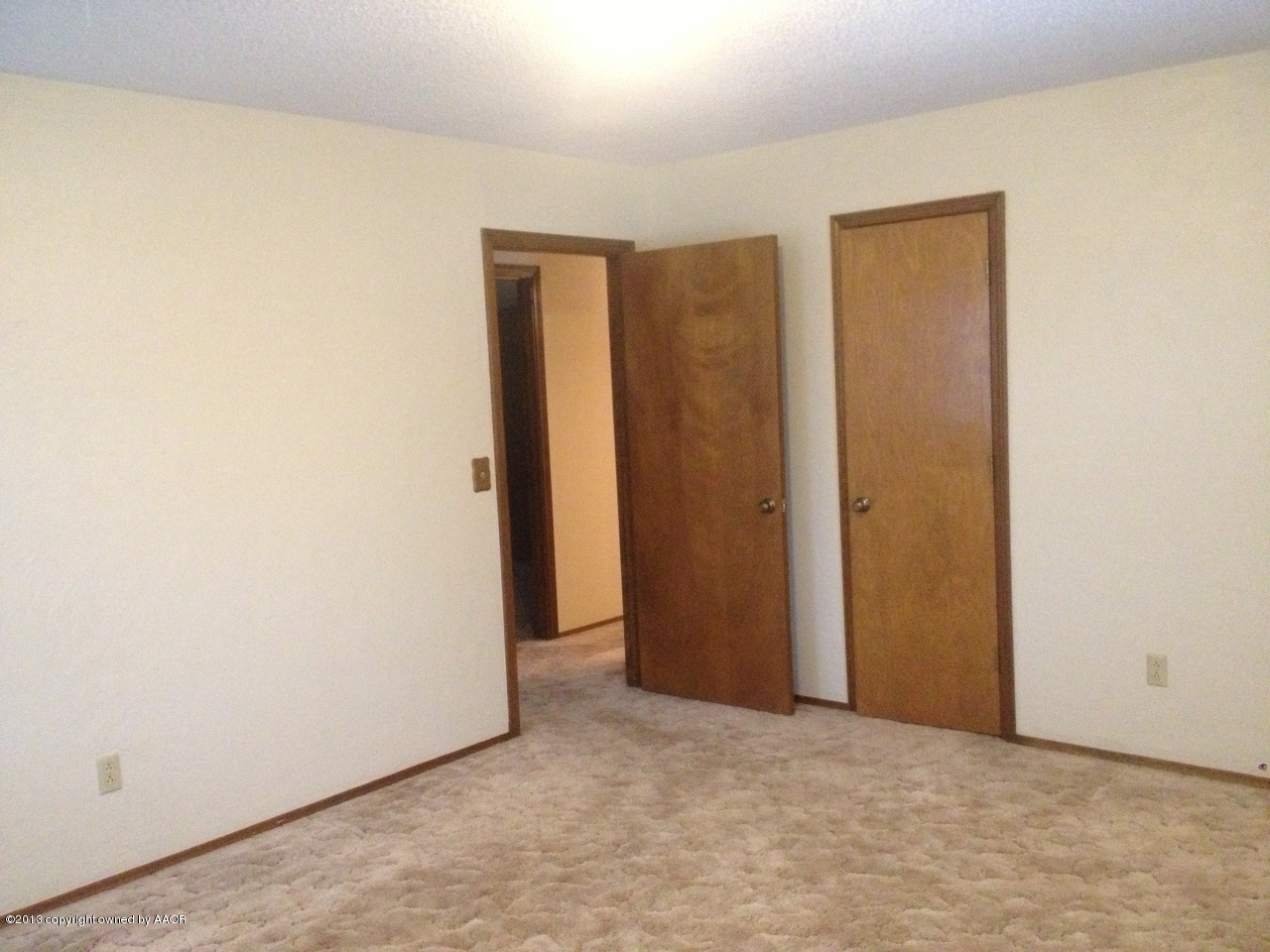 8213 Goodnight Trail Amarillo, TX 79110 - Photo 15 of 20 an empty room with closet area