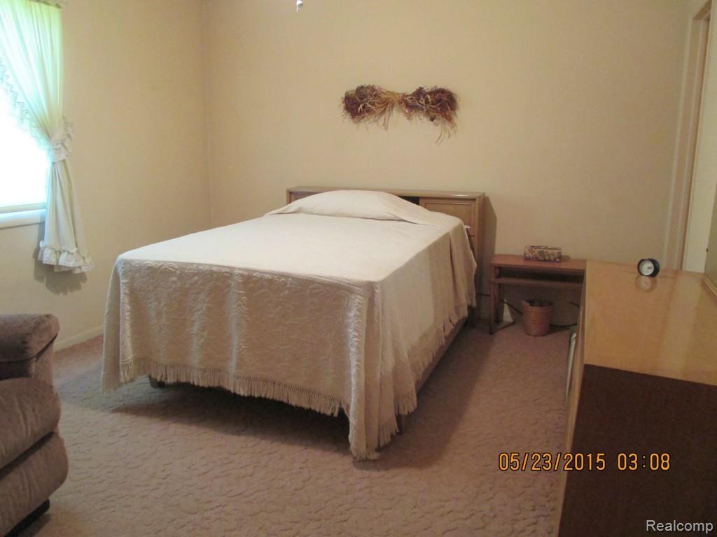 970 North Hintz Road Owosso, MI 48867 - Photo 10 of 11 bedroom 3 pic 2.jpg
