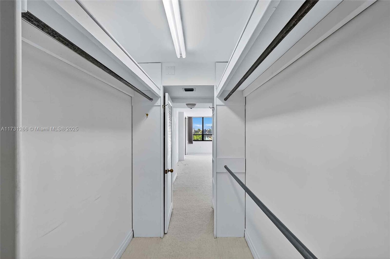 2 Grove Isle Drive, Unit B404 Coconut Grove, FL 33133 - Photo 29 of 36 a view of hallway