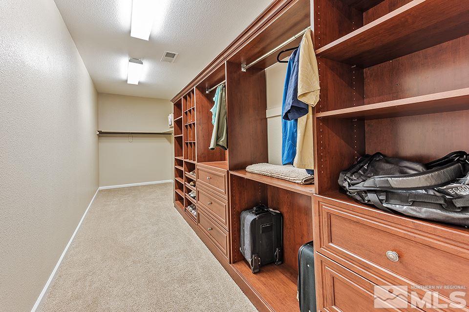 2220 Trakehner Lane Reno, NV 89521 - Photo 12 of 25 a storage room with washer and dryer