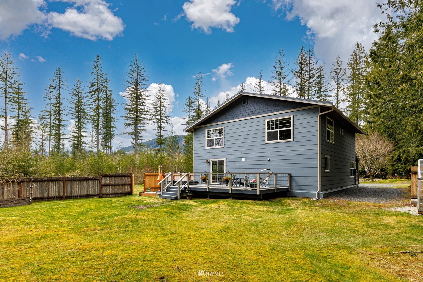 7688 Silver Lake Road Maple Falls, WA 98266 - Photo 36 of 40 a view of a house with a swimming pool