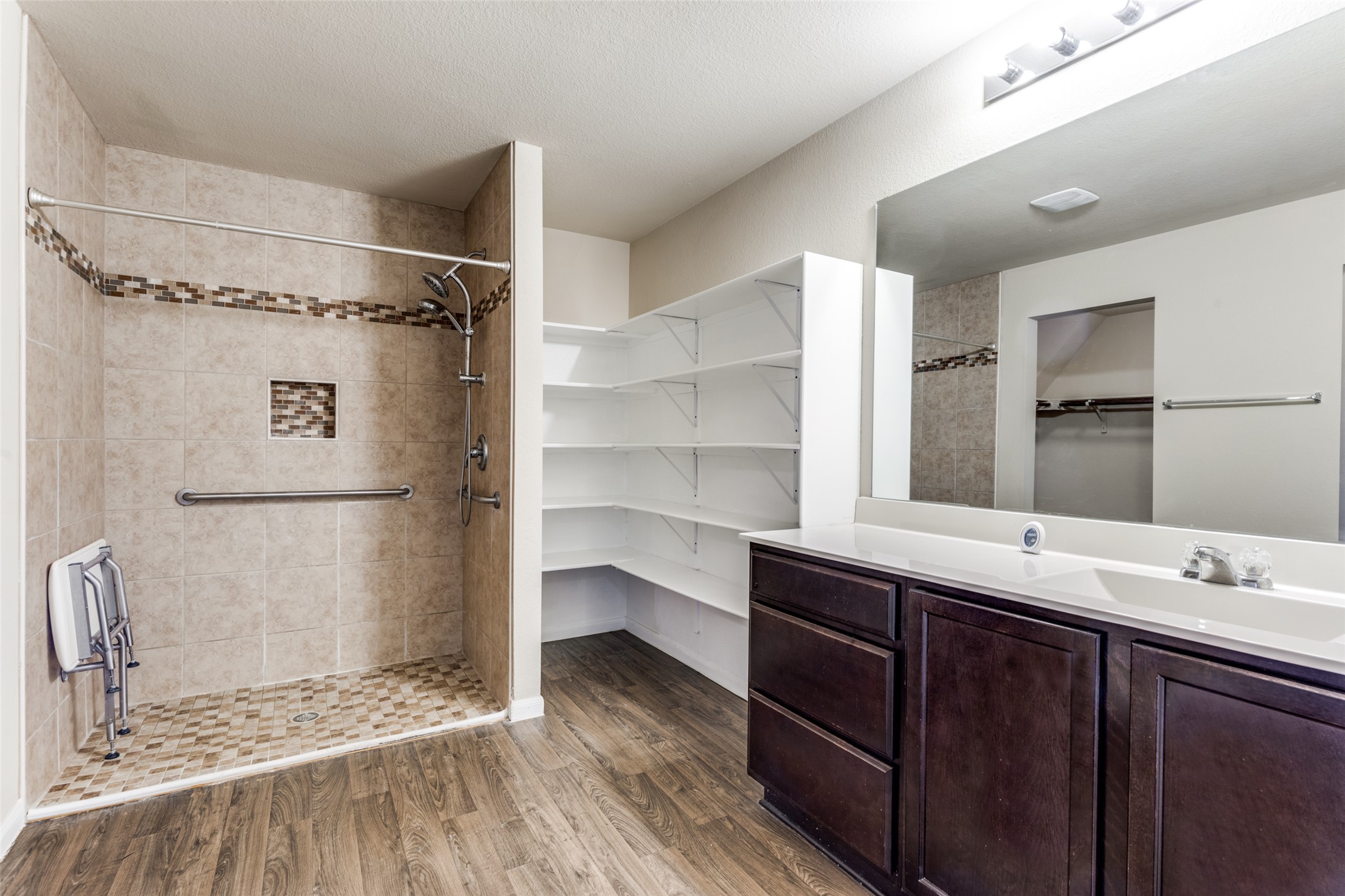 801 Silver Wing Drive Austin, TX 78725 - Photo 16 of 29 a bathroom with a double vanity sink mirror and shower