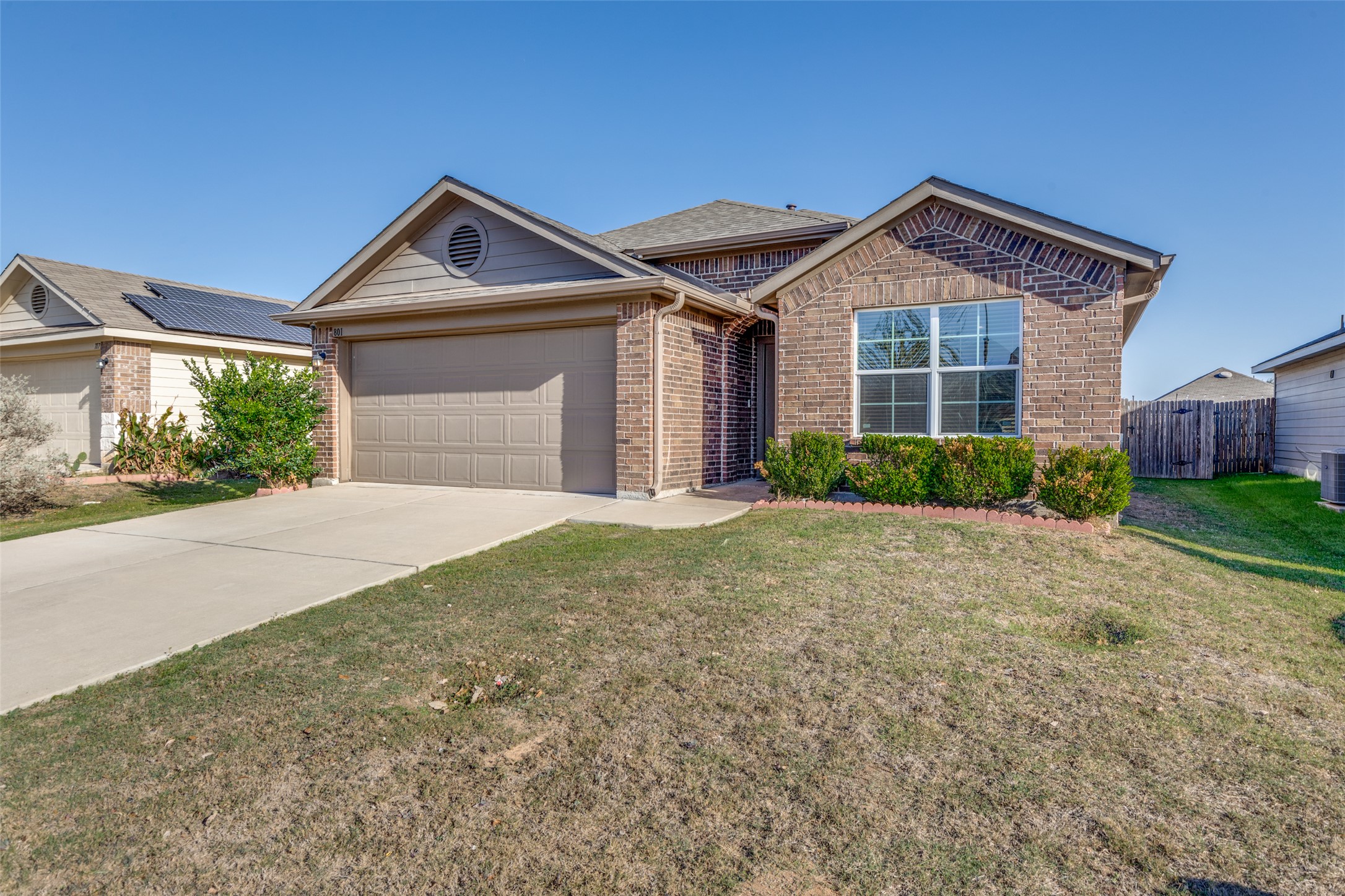 801 Silver Wing Drive Austin, TX 78725 - Photo 2 of 29 a front view of a house with garden