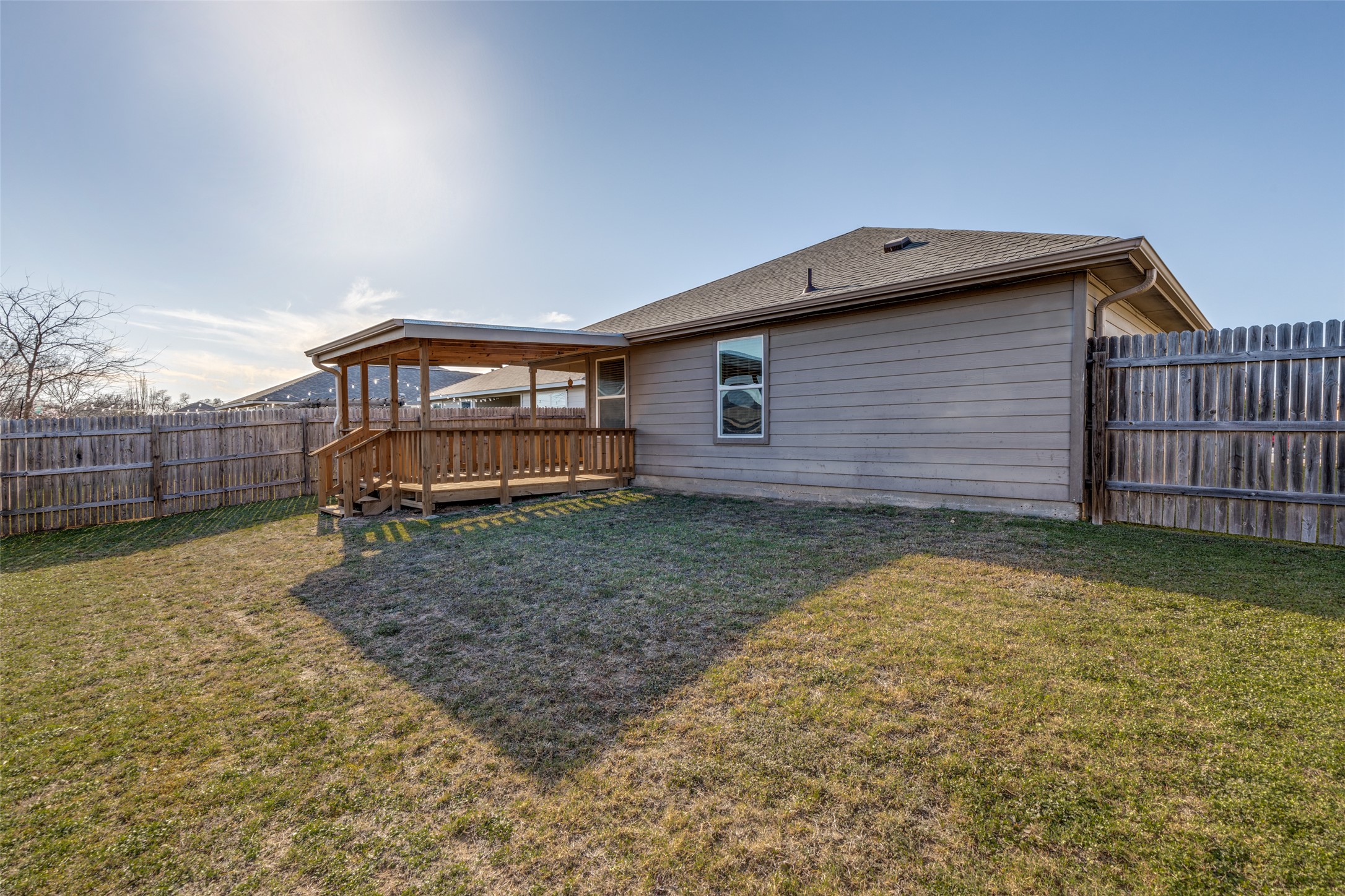 801 Silver Wing Drive Austin, TX 78725 - Photo 25 of 29 a backyard of a house with barbeque oven