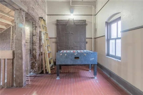 a view of a hallway with entryway