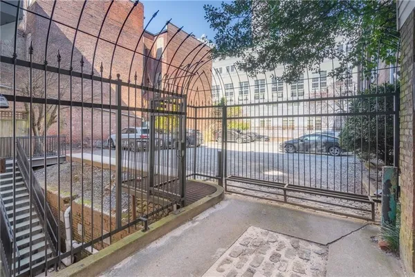 a view of cars parked in front of a building