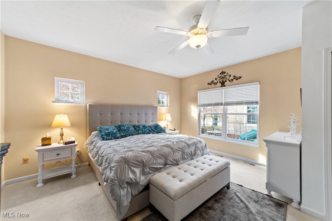 4461 Sexton Road Cleveland, OH 44105 - Photo 14 of 47 Carpeted bedroom featuring baseboards and ceiling fan