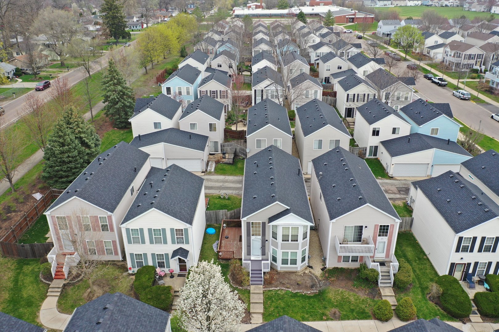 873 Symphony Drive Aurora, IL 60504 - Photo 23 of 24 an aerial view of residential houses with outdoor space and parking
