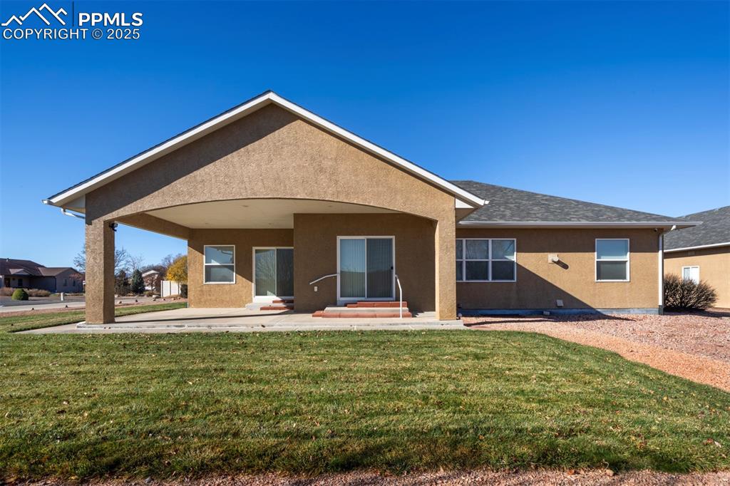 24484 Gale Road Pueblo, CO 81006 - Photo 11 of 43 a view of a house with backyard