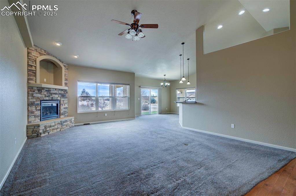 24484 Gale Road Pueblo, CO 81006 - Photo 12 of 43 a view of a livingroom with fireplace and window
