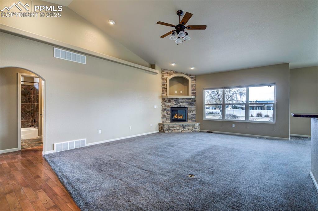 24484 Gale Road Pueblo, CO 81006 - Photo 14 of 43 a view of an empty room with a window and a kitchen