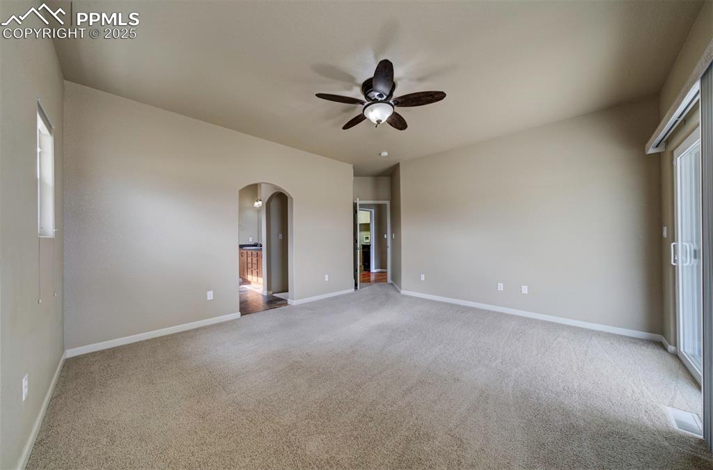 24484 Gale Road Pueblo, CO 81006 - Photo 26 of 43 a view of a livingroom with a ceiling fan and window