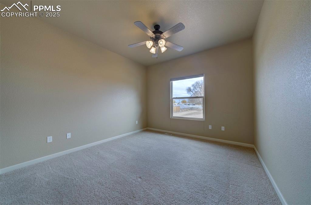 24484 Gale Road Pueblo, CO 81006 - Photo 35 of 43 a view of an empty room with a window
