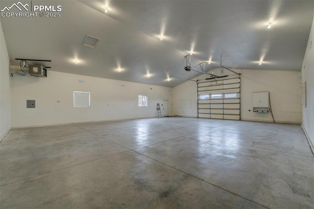 24484 Gale Road Pueblo, CO 81006 - Photo 7 of 43 an empty room with windows and pillars in it