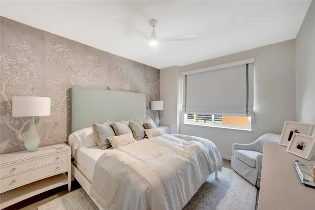 a bedroom with a bed and a couch