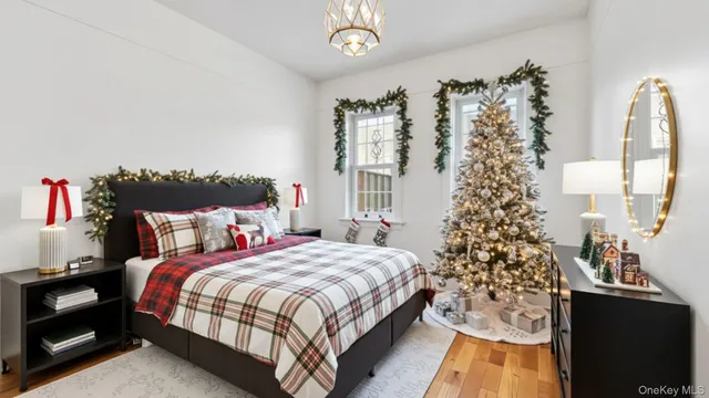 a bedroom with bed and a window