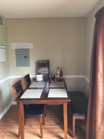 a view of a workspace with furniture