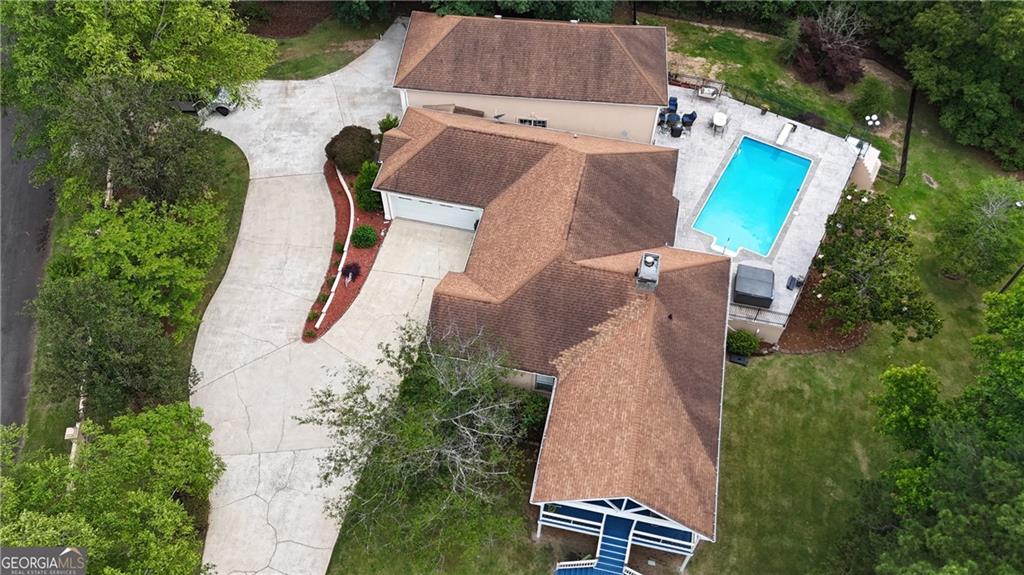 7404 Golfers Villa Rica, GA 30180 - Photo 41 of 43 an aerial view of a house with a yard and trees