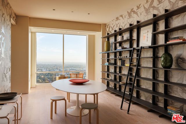 a view of a livingroom with furniture and window