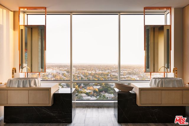 a view of a balcony with furniture and outside view