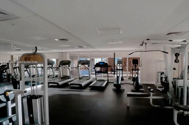 a view of a room with gym equipment