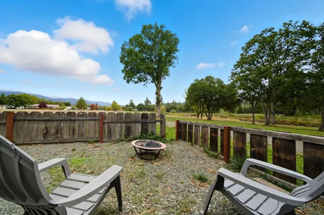 a view of a chairs and table in the terrace