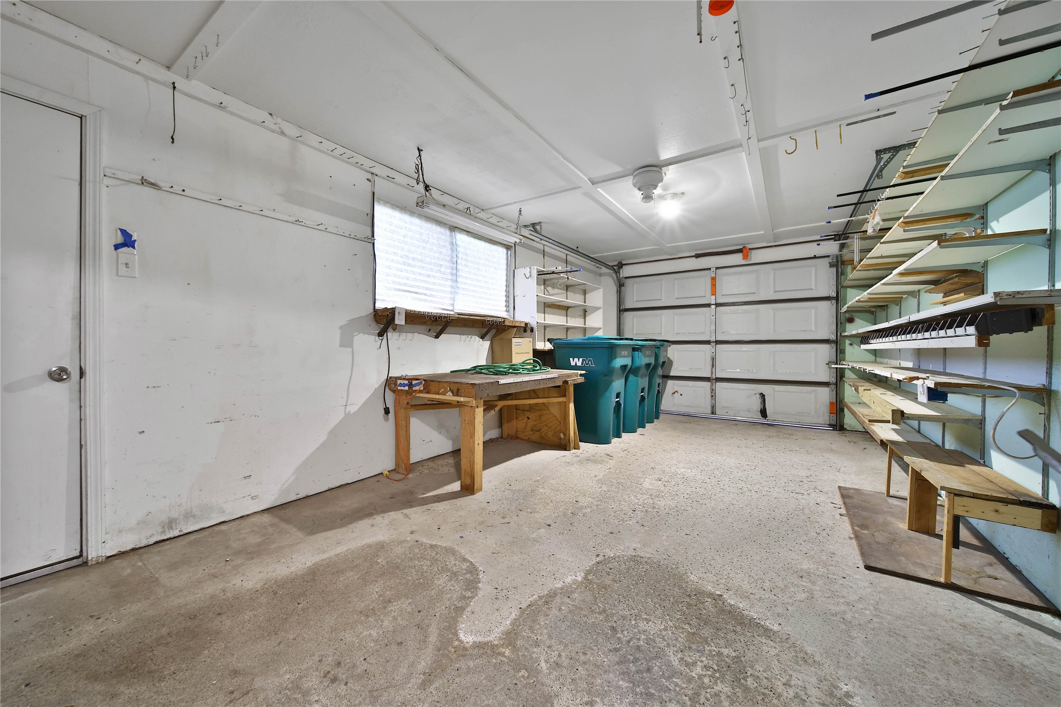 15418 Willis Way Conroe, TX 77384 - Photo 39 of 41 One side of the garage used as workshop previously