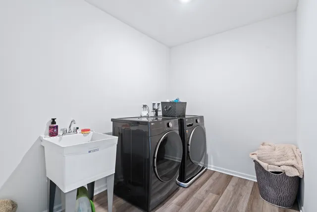 a utility room with dryer and washer