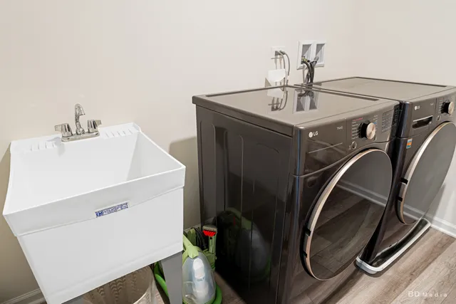 a utility room with dryer and washer