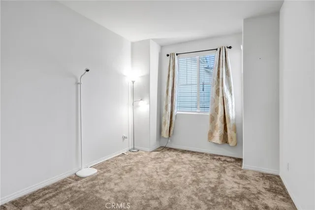 a view of an empty room with window