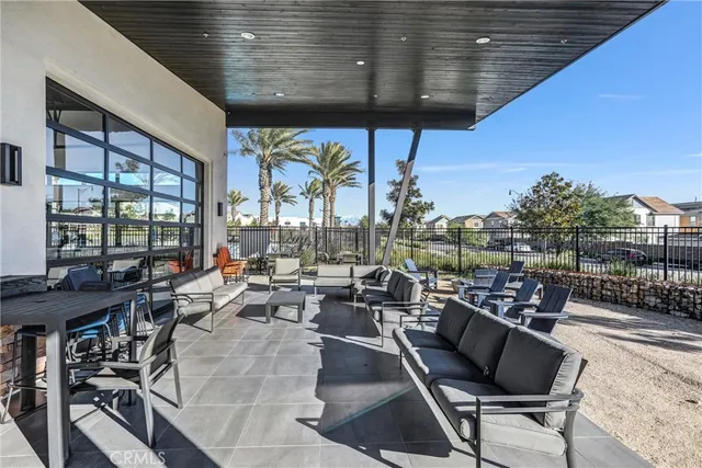 a outdoor space with lots of tables and chairs