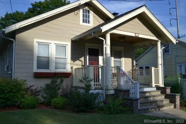 17 Culloden Road Stamford, CT 06902 - Photo 1 of 1 a front view of a house with garden