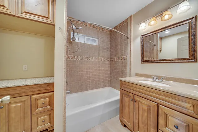 a bathroom with a sink and a bathtub