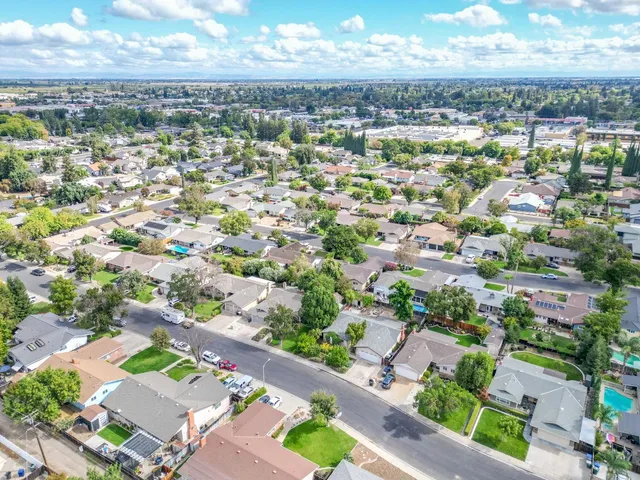 an aerial view of a city with lots of residential buildings