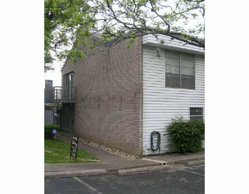3811 E Menchaca Road Austin, TX 78704 - Photo 1 of 1 a house that has a tree in front of it