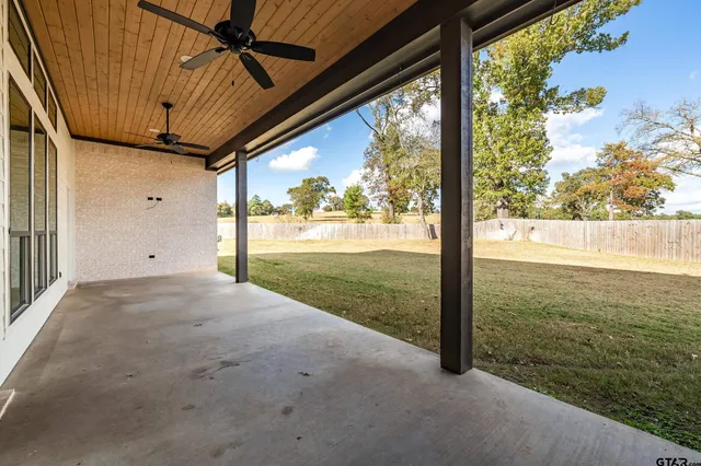 a view of a room with porch and wooden floor