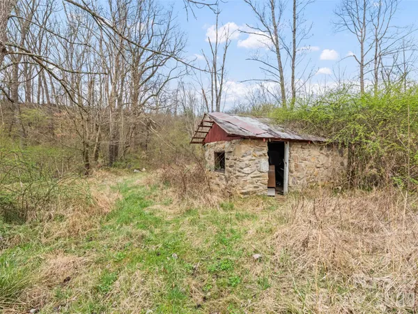 a view of a yard with an outdoor space