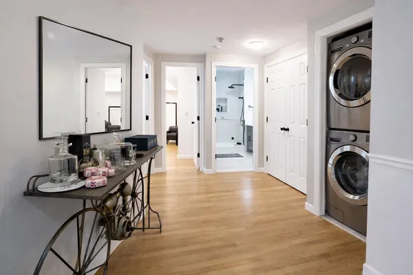 a bedroom with a large bed and a couch