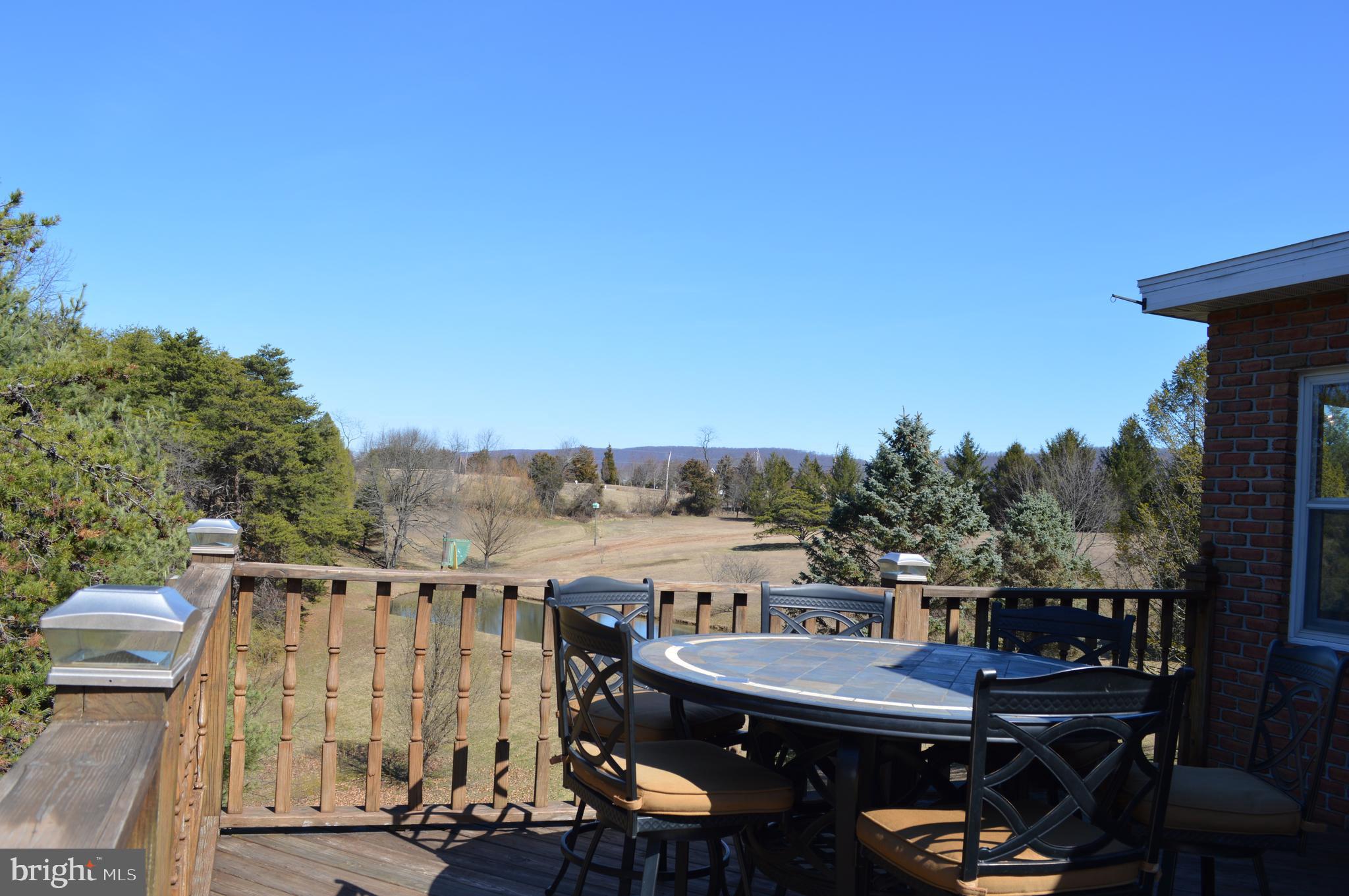 3496 Highland Ridge Road Berkeley Springs, WV 25411 - Photo 50 of 71 living. Solar lights top deck posts