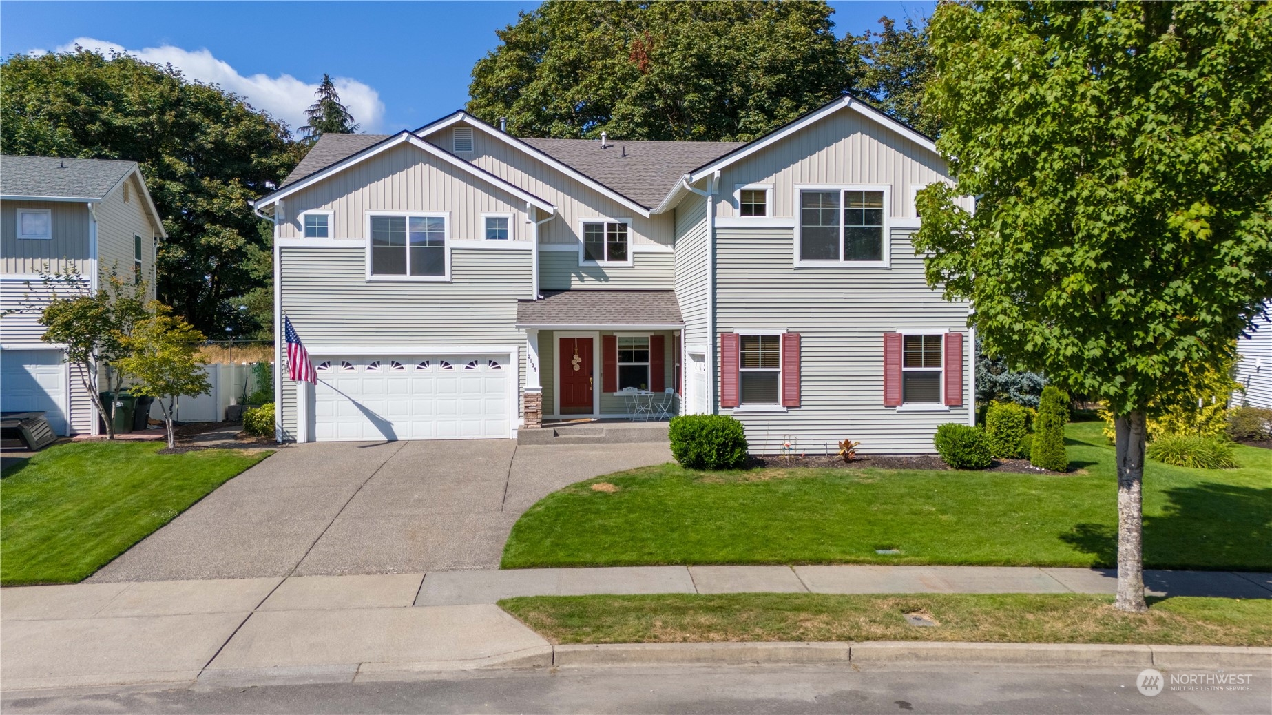 3139 Walker Road DuPont, WA 98327 - Photo 1 of 40 a front view of a house with a yard